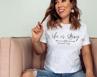 She is Strong Shirt | Proverbs 31:25 Women's Christian Shirt | True Religious Shirt | Gift for Christian | Bible Verse Shirt | Inspirational