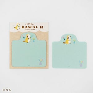 May include: A set of three ceramic mugs with a speckled, matte finish. The mugs are in shades of cream, light gray, and dark gray. Each mug has a simple, minimalist design and a rounded handle.