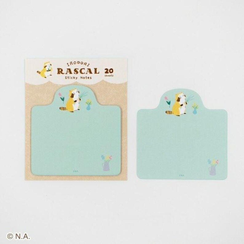 May include: A set of three ceramic mugs with a speckled, matte finish. The mugs are in shades of cream, light gray, and dark gray. Each mug has a simple, minimalist design and a rounded handle.