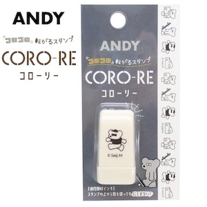 Puede incluir: Un sello rectangular blanco con una ilustraci&oacute;n de oso y el texto "CORO-RE" en marr&oacute;n. El embalaje incluye la marca "ANDY" y texto japon&eacute;s. El sello est&aacute; en una funda de pl&aacute;stico transparente.
