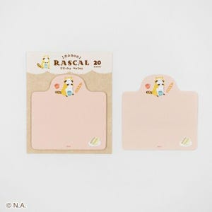 May include: A set of Irodori Rascal sticky notes. The packaging is light brown with the text "Irodori Rascal 20 Sticky Notes". The sticky notes are light pink with a cartoon raccoon illustration and a small cake illustration.