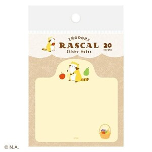 May include: A package of "Irodori Rascal" sticky notes. The design features a cartoon raccoon with a chef's hat, an apple, and a pear. The notes are yellow with a brown border and a basket of fruit.