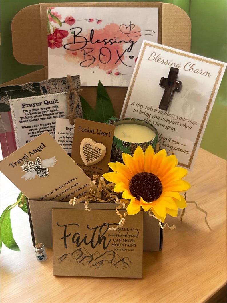 May include: A Blessing Box filled with inspirational items. Includes a prayer quilt, a pocket heart, a travel angel, a candle, a sunflower, and a card with the word "Faith" and the quote "small as a mustard seed can move mountains".