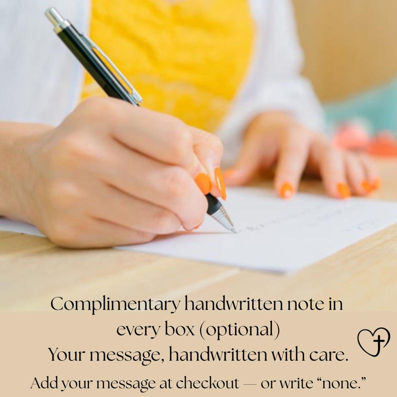 May include: A person's hand writing on a white piece of paper with a black pen. The person is wearing a white shirt and a yellow top. The text on the image says: "Complimentary handwritten note in every box (optional). Your message, handwritten with care."
