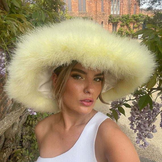 【if you have/Feather Hat】 Amazon.com: Eric Javits Invincible Winter Puffer Bucket Hat