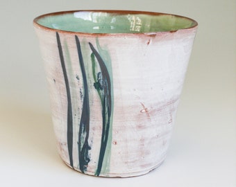 White and green ceramic cup, tumbler, glass, handmade