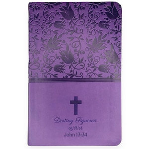 May include: Purple journal with a floral design and a cross on the front. The journal is personalized with the name "Destiny Figueroa", the date "03/18/24", and the scripture reference "John 13:34".