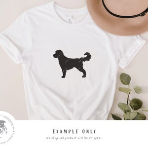 May include: A white t-shirt with a black silhouette of a dog on the front. The text "EXAMPLE ONLY" is printed below the dog silhouette. The text "No physical product will be shipped." is printed below the text "EXAMPLE ONLY".