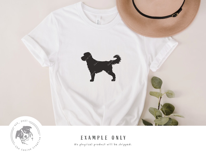 May include: A white t-shirt with a black silhouette of a dog on the front. The text "EXAMPLE ONLY" is printed below the dog silhouette. The text "No physical product will be shipped." is printed below the text "EXAMPLE ONLY".