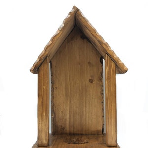 Wooden niche for statues of the Madonna, Saints, and Jesus. Shrine, grotto, oratory, sanctuary, urn, or altar.