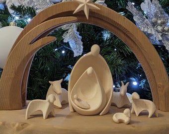 Complete wooden nativity scene with hut with a modern and design style created in Val Gardena. New Made in Italy