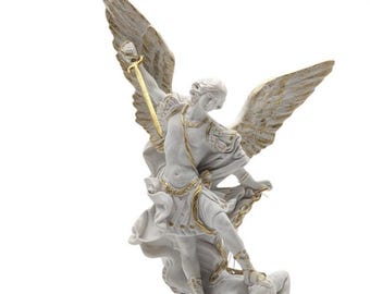 Statue of St. Michael the Archangel, 31 cm, in white marble dust and gold. Made in Tuscany. 12.20'' Statue of St. Michael in white marble dust.