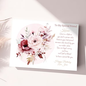 May include: A pink and white floral card with a message that reads "To My Special Friend Karen Once in a lifetime you find a person who becomes your best friend someone who stands by you no matter what. You are loyal, caring and true and I feel so blessed to have a friend like you. Happy Birthday Love Jean"