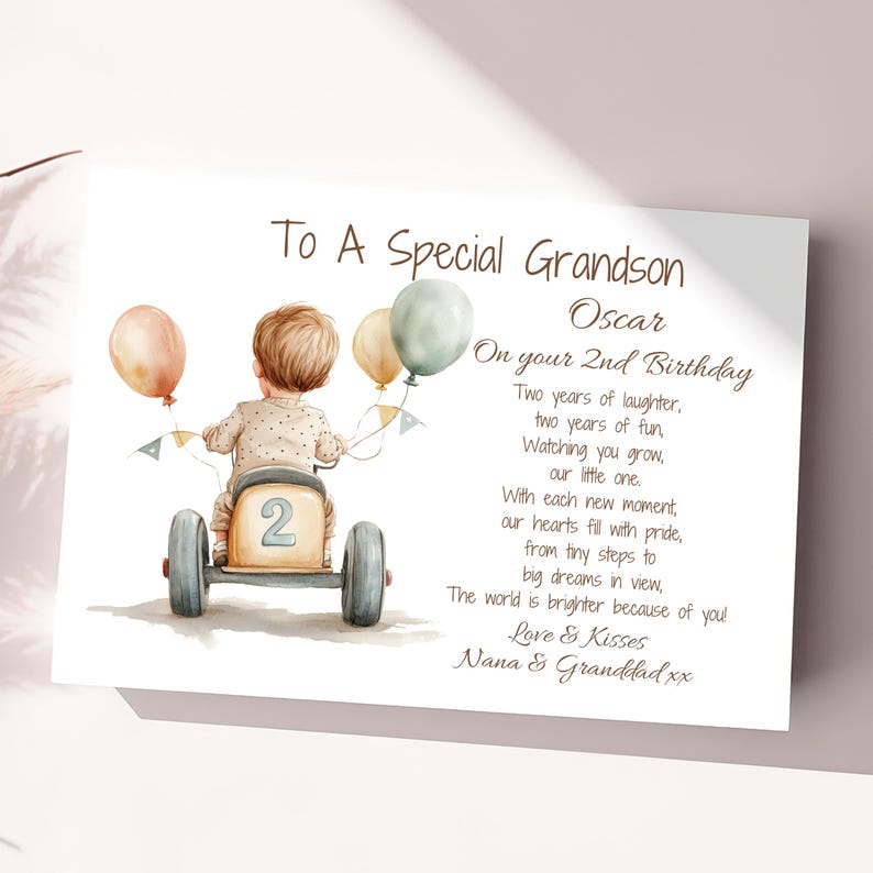 May include: A birthday card with a watercolor illustration of a child riding a toy car with balloons. The card reads "To A Special Grandson Oscar On your 2nd Birthday Two years of laughter, two years of fun, Watching you grow, our little one. With each new moment, our hearts fill with pride, from tiny steps to big dreams in view, The world is brighter because of you! Love & Kisses Nana & Granddad xx"