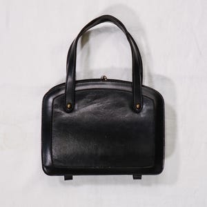 Bolso de mano vintage auténtico de cuero negro con dos bolsillos, años 40 y 50.