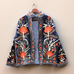 May include: A rustic wooden sign with the text "Welcome to our home" in white lettering. The sign features a distressed finish and a simple, inviting design, perfect for a front porch or entryway.