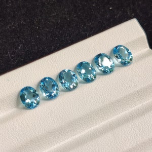 Natural Swiss Blue Topaz Gemstone Lot: Oval Cut, 6X8 MM (6 Pcs)