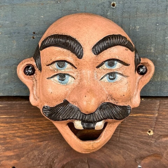 Cast Iron 4-Eyed Bottle Opener Cast Iron 4-Eyed Bottle Opener