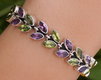 Pulsera de amatista y peridoto: Joyería artesanal de plata de ley con piedras preciosas.