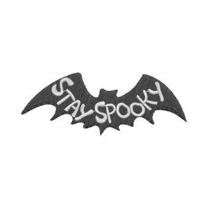 May include: A black embroidered iron-on patch shaped like a bat with the text "Stay Spooky" in white.