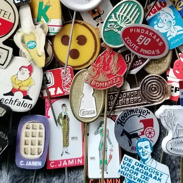 1000's vintage pins. Pins that were previously issued as promotional material from various manufacturers. European advertising pins.