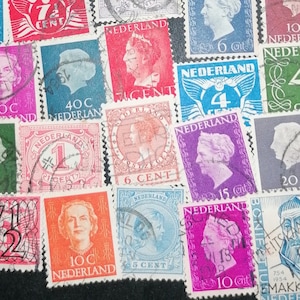 May include: A collection of vintage Dutch postage stamps featuring various designs and denominations. The stamps are in different colors and sizes, and some have images of people, animals, and buildings. The stamps are arranged in a grid pattern on a black background.