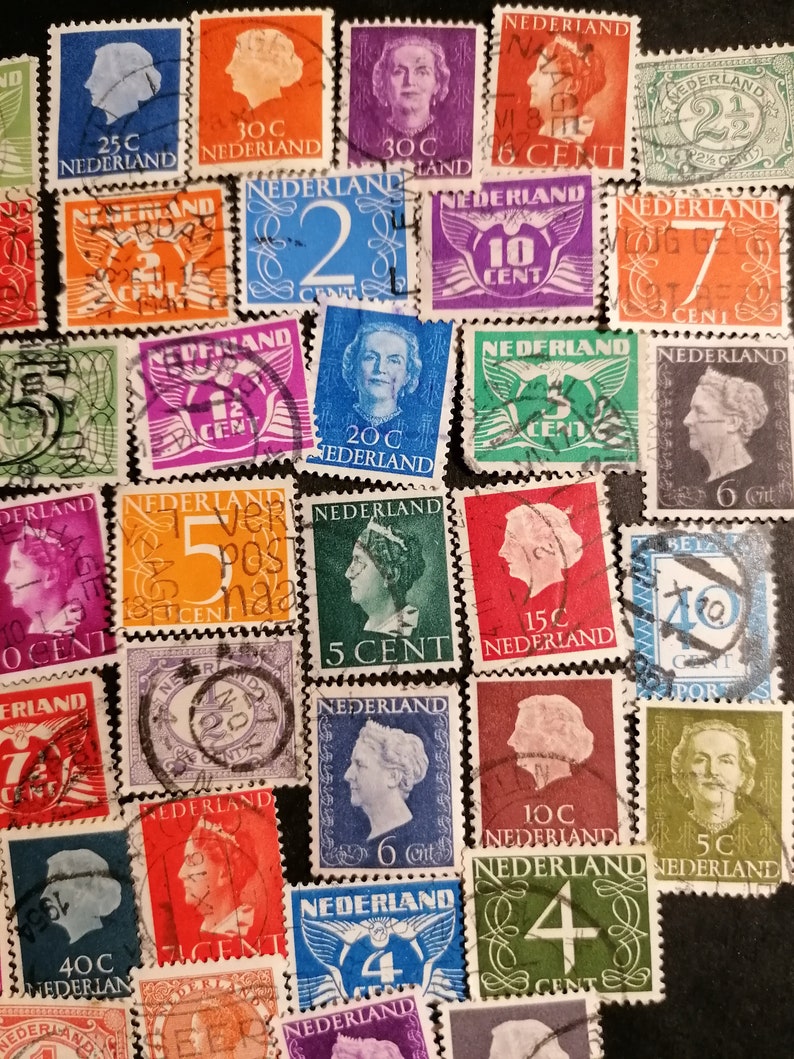 May include: A collection of vintage Dutch postage stamps featuring various denominations and designs. The stamps are in various colors, including red, blue, green, and orange. Some stamps feature portraits of historical figures, while others feature abstract designs.
