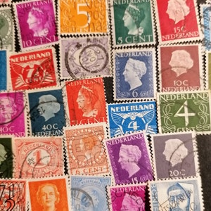May include: A collection of vintage Dutch postage stamps featuring various designs and denominations. The stamps are in different colors, including red, blue, green, orange, and yellow. Some stamps feature portraits of historical figures, while others depict scenes from Dutch history.