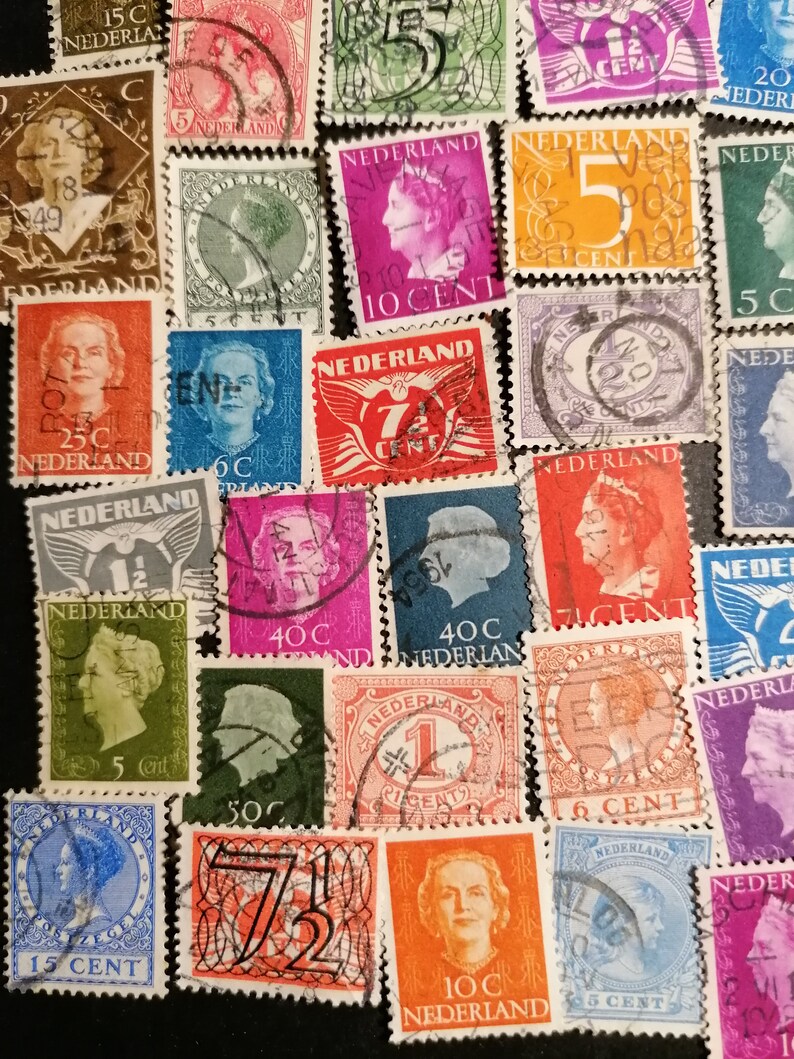 May include: A collection of vintage Dutch postage stamps featuring various denominations and designs. The stamps are in different colors, including red, blue, green, and orange. Some stamps feature portraits of people, while others feature images of birds, flowers, and other designs. The stamps are all in good condition and would be a great addition to any stamp collection.