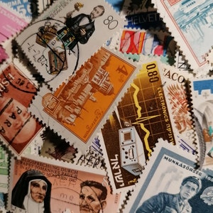 May include: A collection of vintage postage stamps from various countries, including Bulgaria, Switzerland, Hungary, and Israel. The stamps feature a variety of designs, including a man in a suit, a building, a heart rate monitor, and a man with a gun. The stamps are in various colors, including red, blue, green, and yellow.