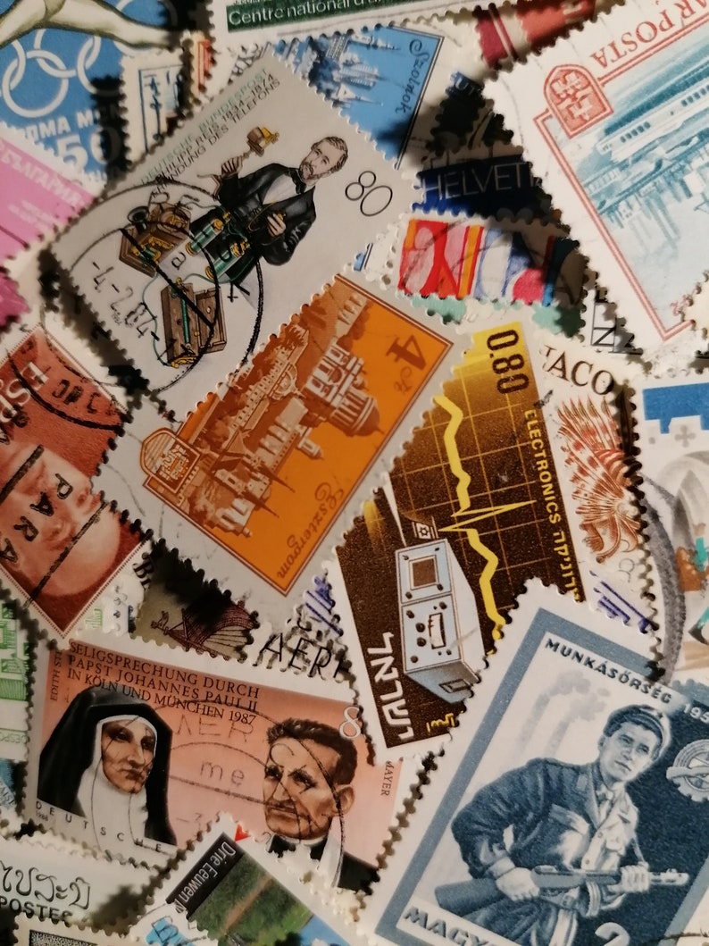 May include: A collection of vintage postage stamps from various countries, including Bulgaria, Switzerland, Hungary, and Israel. The stamps feature a variety of designs, including a man in a suit, a building, a heart rate monitor, and a man with a gun. The stamps are in various colors, including red, blue, green, and yellow.