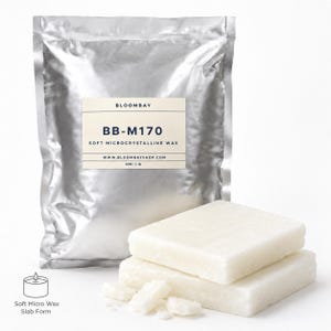 May include: A silver bag of soft microcrystalline wax with a label that reads "BLOOMBAY BB-M170". Two rectangular slabs of white wax and some broken pieces are in front of the bag. The net weight is 454 grams.