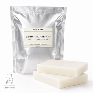 May include: A silver bag of BB-Hurricane wax with a label that reads "BB-HURRICANE WAX HIGH-MELT PARAFFIN WAX". Two rectangular wax blocks are in front of the bag. The net weight is 454 grams. The image also includes a candle shell graphic.
