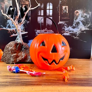 Blow Mold Pumpkin Halloween Candy Pail Candy Bucket Glows under black light
