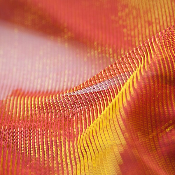 bright gold orange metallic sheer stretch polyester fabric shiny bright orange knit soft fabric see through stretchy chromatic dress fabric