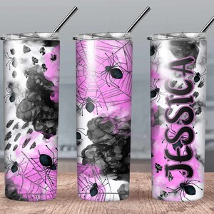 May include: Three stainless steel tumblers with a pink and black spiderweb design. The tumblers have a black and white abstract design with pink accents. One tumbler has the name "Jessica" written in black on the side.