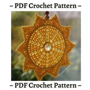 May include: A crochet pattern for a sun-shaped wall hanging. The pattern is made with yellow yarn and features a crystal in the centre. The pattern is available as a PDF download.