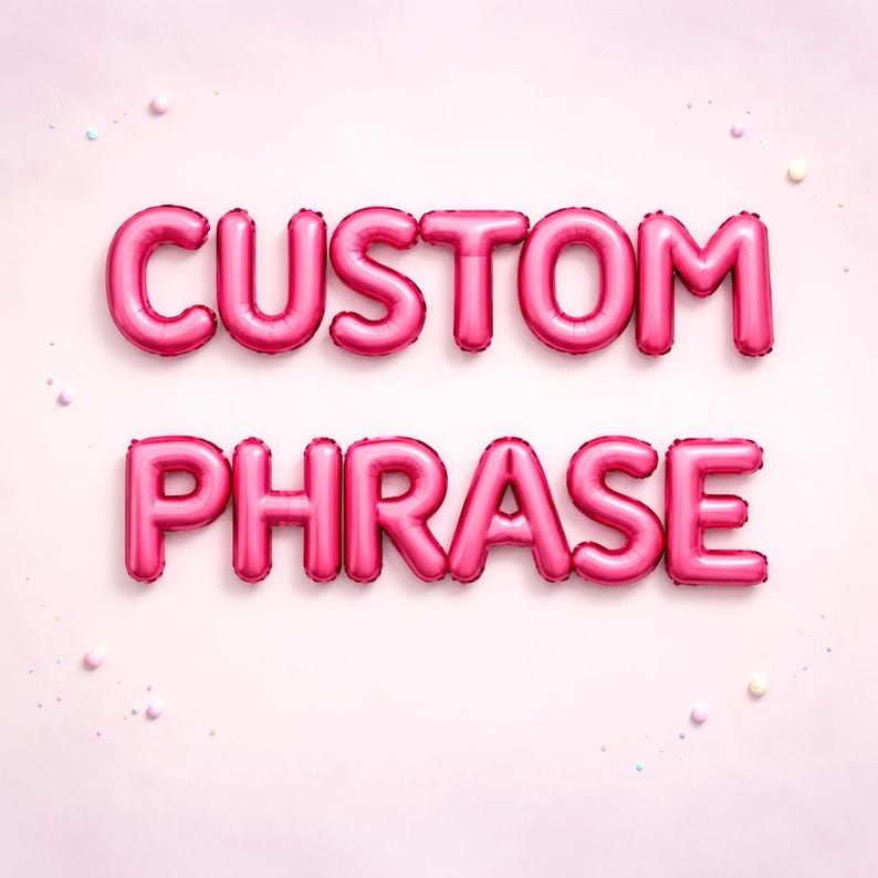 May include: Pink foil balloons spelling out "CUSTOM PHRASE" against a light pink background. The balloons are inflated and have a shiny metallic finish. Small, colorful confetti dots are scattered around the text, adding a festive touch.