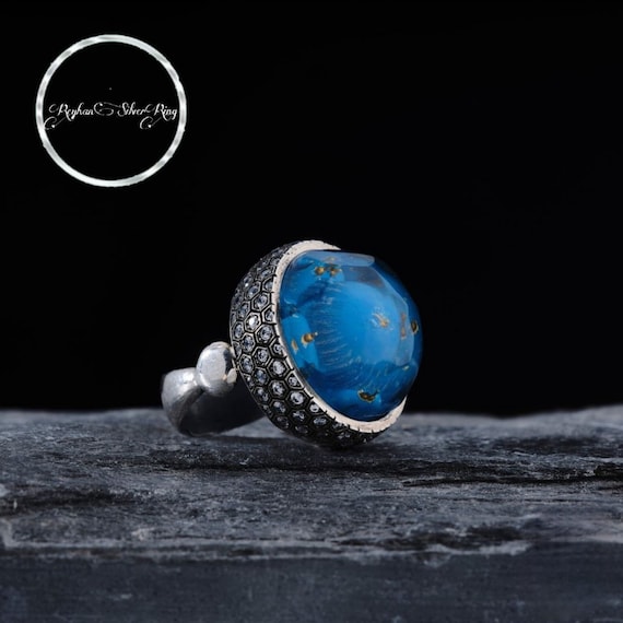 Handcrafted Sterling Silver Ring: Diamond-Cut Gemstone Mosque Carving