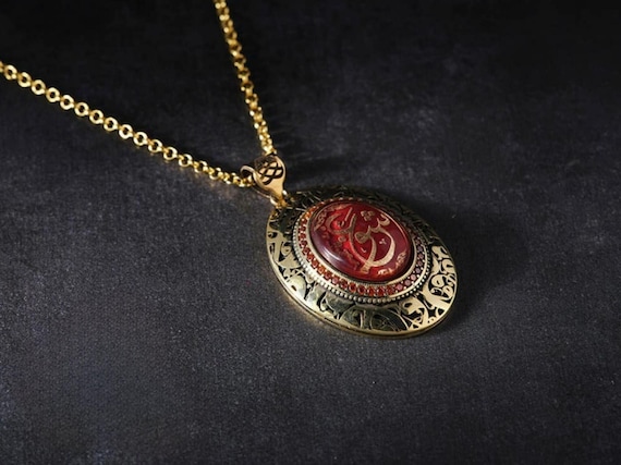 Amber Stone Sterling Silver Vav Necklace, Red Zircon Accent