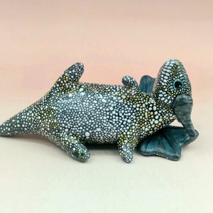 Fat baby dragon friend with mosaic scales