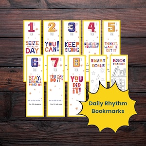 May include: Set of 8 colorful bookmarks with motivational quotes and tasks for each day of the week. The bookmarks feature yellow, red, blue, and white colors with stars and other decorative elements. The text on the bookmarks includes "Seize the Day", "You Can", "Keep Going", "Believe in Yourself", "Think It, Want It, Get It", "Stay Strong & Power On", "You Can Do It", and "You Did It!"