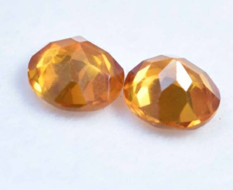 Pair top most quality yellow sapphire gemstones round excellent Pair top most quality yellow sapphire gemstones round excellent