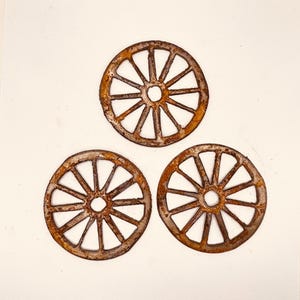 Rusty metal Wagon Wheels set of 3; rustic designs for crafts, ornaments, magnets, signs, home garden western farmhouse accents