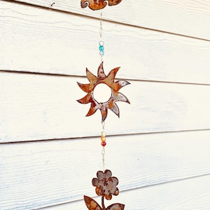 Rusty Metal Cloud, Sun, Flower wind chime;  metal art for your patio, garden, outdoors, home accent