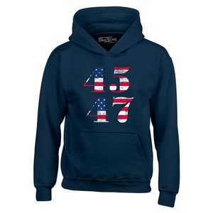 May include: Navy blue hooded sweatshirt with the numbers 45 and 47 printed on the front. The numbers are in a distressed style and are overlaid with an American flag design.