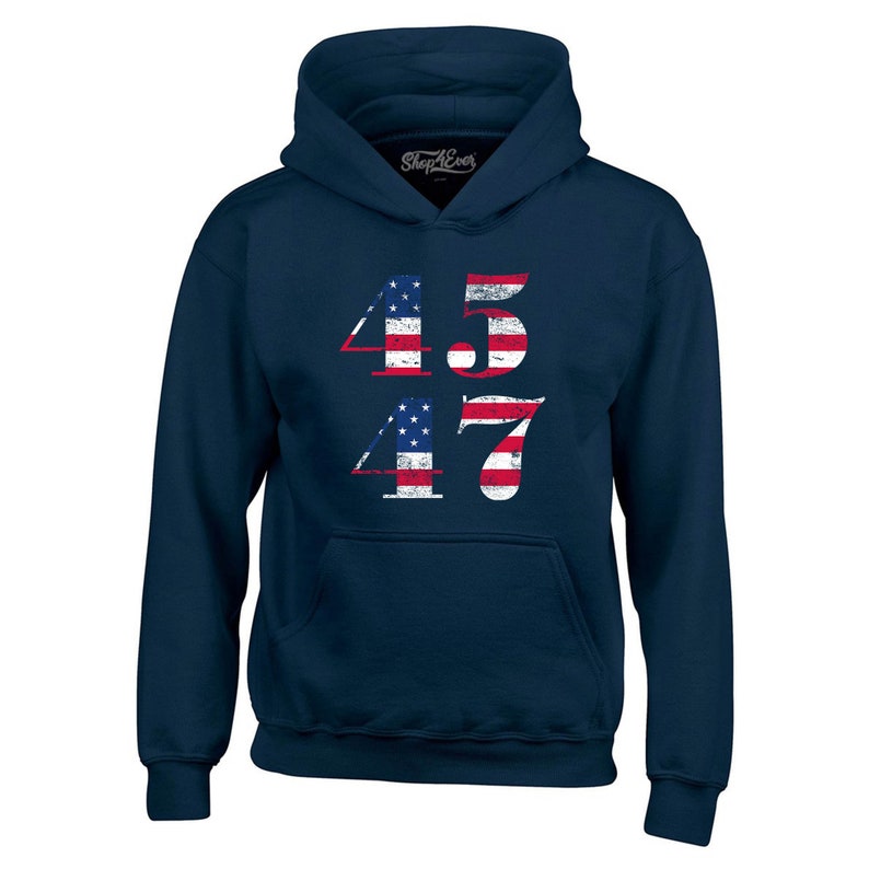 May include: Navy blue hooded sweatshirt with the numbers 45 and 47 printed on the front. The numbers are in a distressed style and are overlaid with an American flag design.