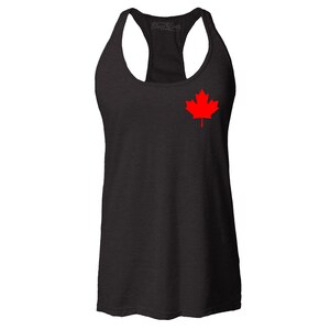 May include: Black racerback tank top with a red Canadian maple leaf on the left chest.