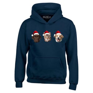 May include: A navy blue hooded sweatshirt with a graphic of a dog, cat, and dog wearing Santa hats.