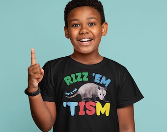 Rizz 'Em with The 'Tism Austim Neurodiversity Child's T-Shirt Kids Tee Autism Awareness Month. Autism Awareness Shirt. Autism Gift.